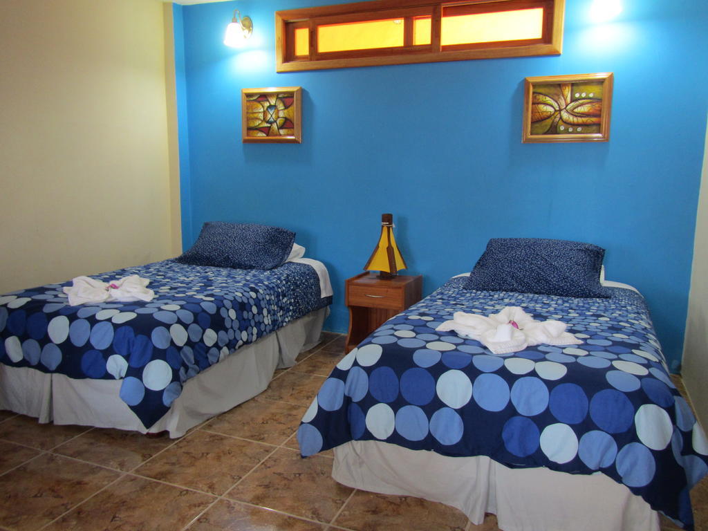 Hospedaje Casa Soleil Puerto Villamil Quarto foto